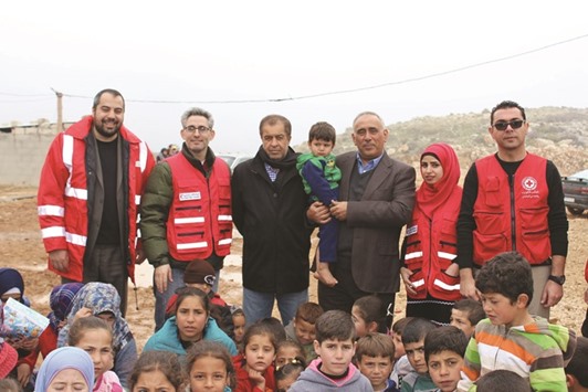 A group photo with Syrian children.