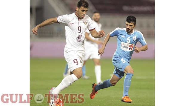 Abderrazak Hamdallah (left) converted a penalty in El Jaishu2019s 1-0 victory over Al Wakrah at the Qatar Stars League title. PICTURE:  Othman Iraqi