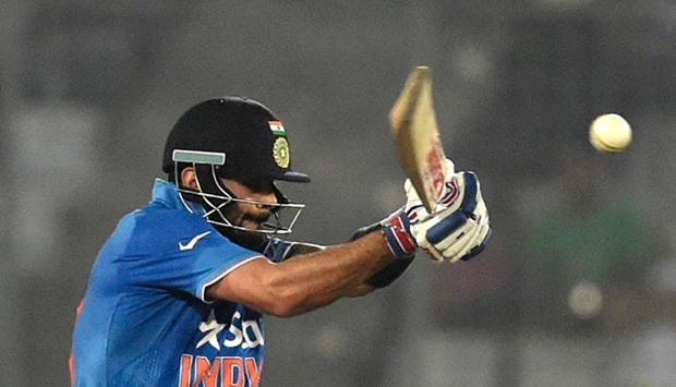 Virat Kohli plays a shot during the Asia Cup match against Pakistan in Dhaka on Saturday.