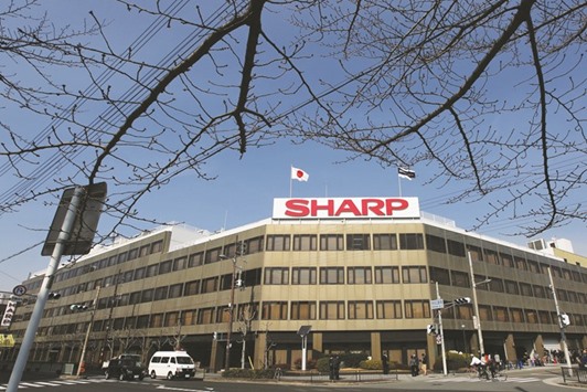 The headquarters of Sharp is seen in Osaka. Foxconn Technology and Sharp worked through the weekend to salvage their proposed $6bn deal with one potential outcome being a revision to terms the Japaneseu2019s board approved just last week, according to reports.
