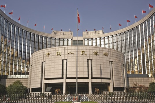 The Peopleu2019s Bank of China headquarters in Beijing. The PBoC extended the yuanu2019s trading hours to 11:30pm in January to overlap with European hours after the International Monetary Fund decided it would admit the yuan into its Special Drawing Rights basket by next October, a key step on the way to becoming an international reserve currency.