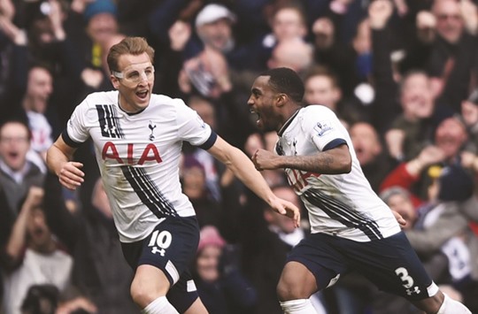 Tottenhamu2019s Danny Rose celebrates scoring their second goal with Harry Kane during their match against Swansea yesterday.