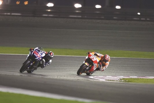 Movistar Yamaha rider Jorge Lorenzo (left) and Marc Marquez of Repsol Honda in action at the Losail International Circuit.