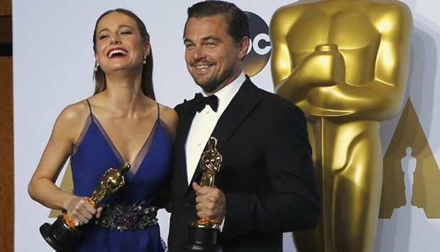 Best actress Brie Larson (Room) and best actor Leonardo DiCaprio (The Revenant) pose during the 88th Academy Awards in Hollywood on Sunday.