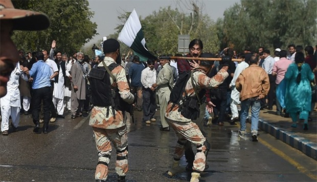Pakistani paramilitary soldiers baton charge on employees of Pakistan International Airlines (PIA) d