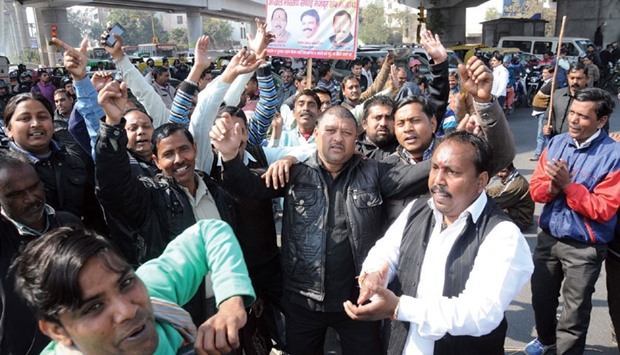 Employees of three civic bodies stage a protest over the non-payment of salaries in New Delhi yesterday.