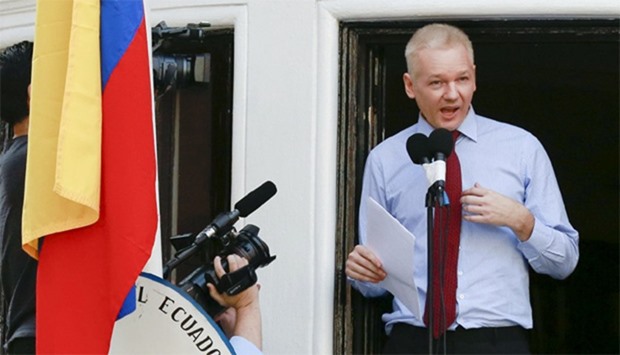 WikiLeaks founder Julian Assange speaks to the media outside the Ecuador embassy
