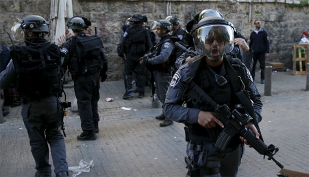 Israeli police secure the area of attack