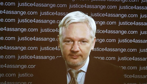 WikiLeaks founder Julian Assange appears on screen via video link during a news conference at the Frontline Club in London, Britain. Reuters