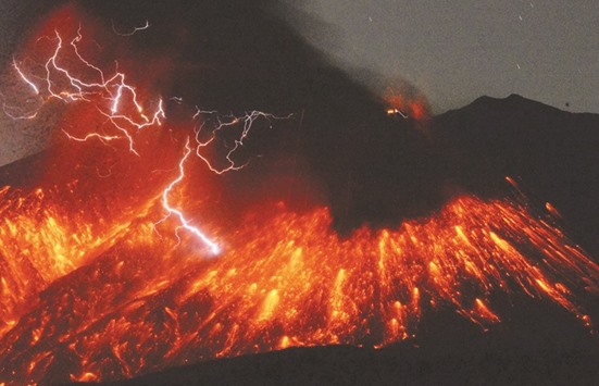 Volcanic lightning is seen at an eruption of Mount Sakurajima, in this photo taken by Kyodo yesterday from Tarumizu city, Kagoshima prefecture, southwestern Japan. The volcano about 50km (30 miles) from a nuclear plant erupted yesterday, Japanu2019s Meteorological Agency said, sending fountains of lava into the night sky.