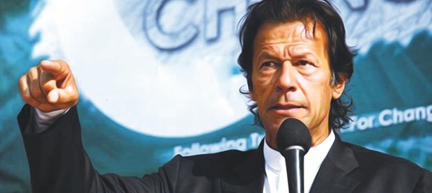 PTI chief Imran Khan addressing a rally.