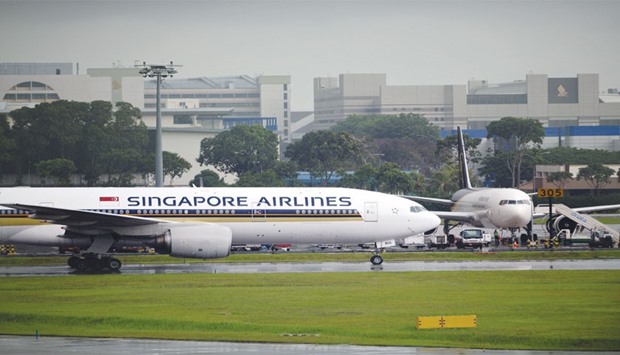 Singapore Airlines (SIA) said its third quarter net profit surged 36% from the previous year, thanks