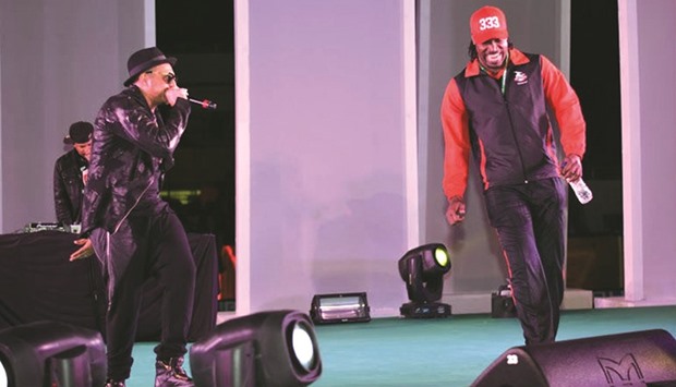 Qatar-owned Lahore Qalandarsu2019 Chris Gayle (R) dances with singer Sean Paul during the opening ceremony of the PSL on Thursday night.