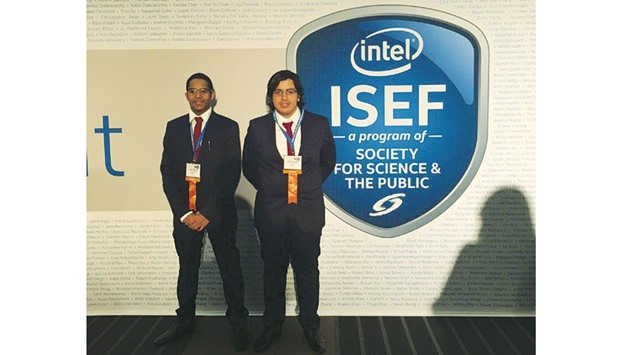 Winning team from Qatar with their project display board at Intel ISEF in the United States.