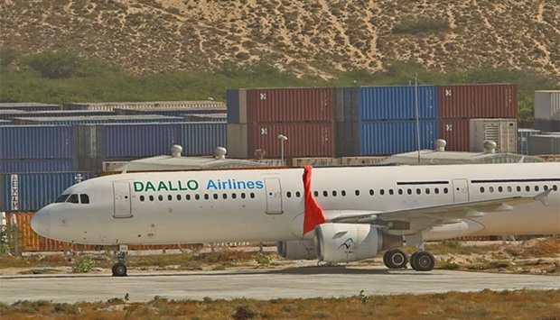An aircraft belonging to Daallo Airlines is parked at the Aden Abdulle international airport after making an emergency landing following an explosion inside the plane in Somalia's capital Mogadishu, February 3, 2016.