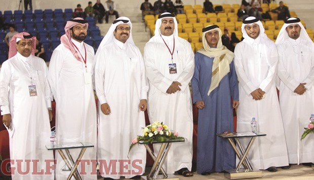 Minister of Energy and Industry HE Dr Mohamed bin Saleh al-Sada (third from left), Qatar Rugby Federation president Yousef al-Kuwari (centre), QRF general secretary Ali al-Malki (second from left) and other dignitaries on the opening day of the Qatar Rugby 7s League at Aspire Park yesterday. PICTURES: Nasar TK