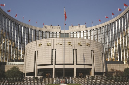 The Peopleu2019s Bank of China headquarters in Beijing. The PBoC has stepped up efforts to stem capital outflows, warning speculators that they will be punished.