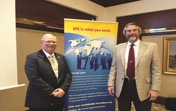 Qatar SPE Section programme chair Michael Gunningham (left) with the presenter, Brian Schwanitz of Welltec.