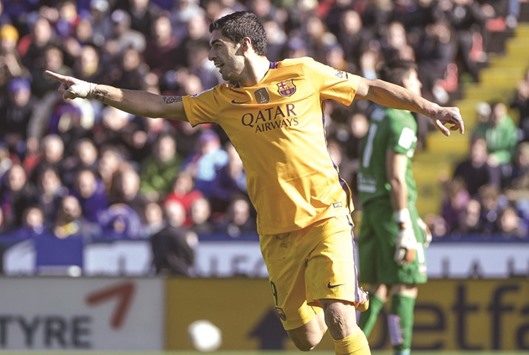 Barcelona's Uruguayan forward Luis Suarez celebrates after scoring against Levante in their La Liga clash in Valencia yesterday. Barcelona won 2-0. (AFP)