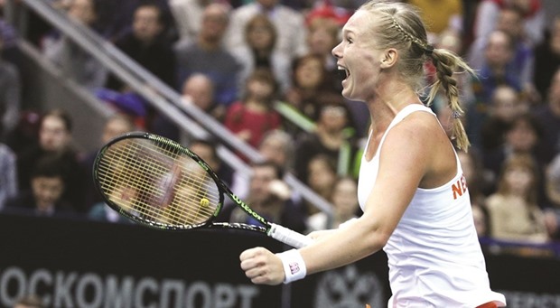 Kiki Bertens of the Netherlands celebrates her victory over Russiau2019s Svetlana Kuznetsova in their Fed Cup World Group tennis match in Moscow yesterday. (Reuters)