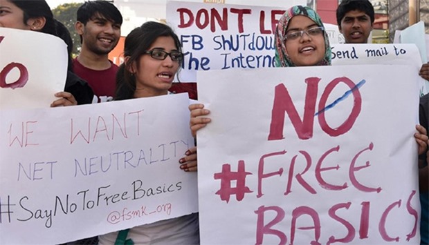 Indian demonstrators hold placards during a protest against Facebooku2019s Free Basics initiative