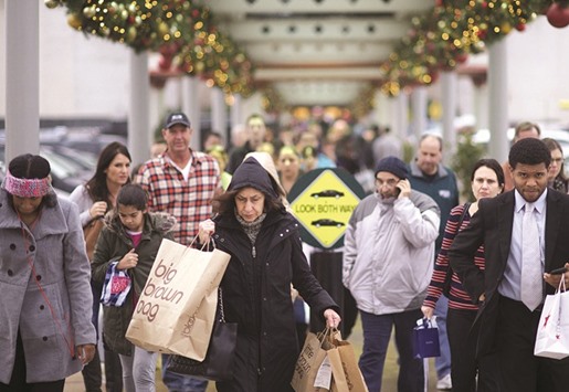 Shoppers walk along a connecting path from The Court to The Plaza at the King of Prussia Mall, United Statesu2019 largest retail shopping space in King of Prussia, Pennsylvania. US retail sales figures will give clues to the state of consumer confidence in the worldu2019s largest economy.