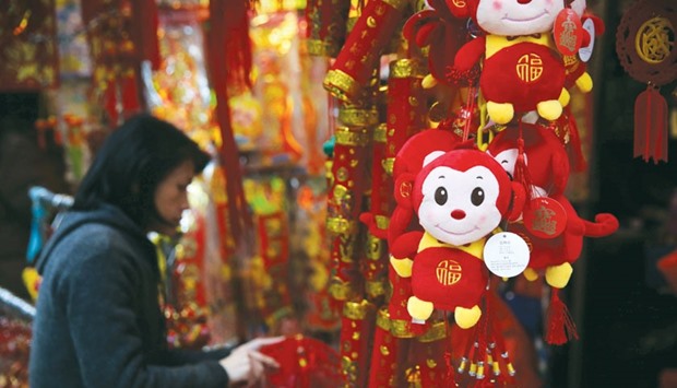 A toy monkey is displayed for sale at a market in the Wan Chai district in Hong Kong.