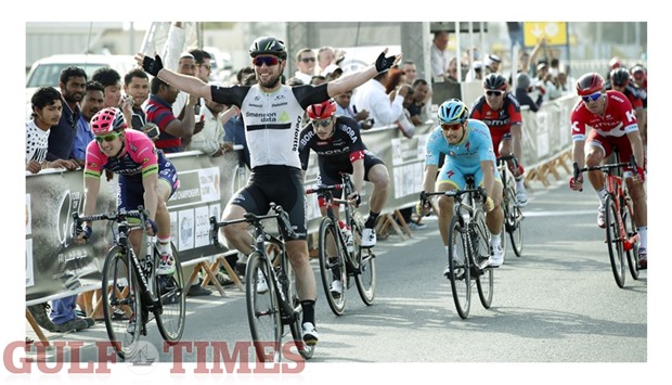 Dimension Data rider Mark Cavendish celebrates as he crosses the finish line to win the first stage of Tour of Qatar yesterday. PICTURE: Jayaram