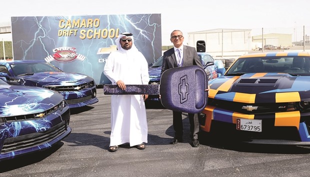 Fahad Bahzad, left, and Khalid Samir during the launch of the Camaro Drift School in Industrial Area yesterday. PICTURES: Shaji Kayamkulam