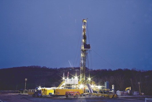 A natural gas drilling rig stands on a Chesapeake Energy Corp drill site in Bradford County, Pennsylvania. Chesapeake said on Monday it had no plans to file for bankruptcy after sources told Reuters the firm, whose debt is eight times its market value, had asked its longtime counsel to look at restructuring options.