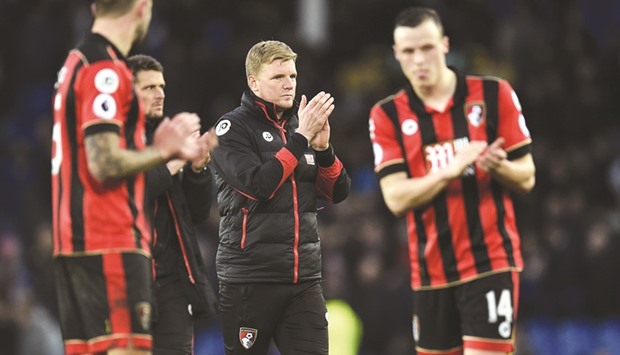 Bournemouth manager Eddie Howe (centre) applauds supporters on the pitch after their loss to Everton in their EPL match  at Goodison Park in Liverpool earlier this month. (AFP)