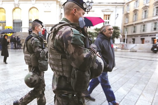 French soldiers patrol in Nice yesterday ahead of the 133rd edition of the Nice Carnival.
