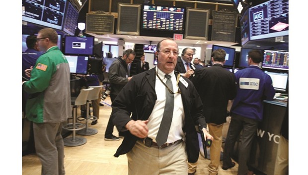 Traders work on the floor of the New York Stock Exchange. Buoyant oil prices since Donald Trumpu2019s election have provided no lasting halo effect for energy stocks as the sectoru2019s profit rebound has lacked vigour, but that could change in the week ahead with a fresh crop of quarterly scorecards.