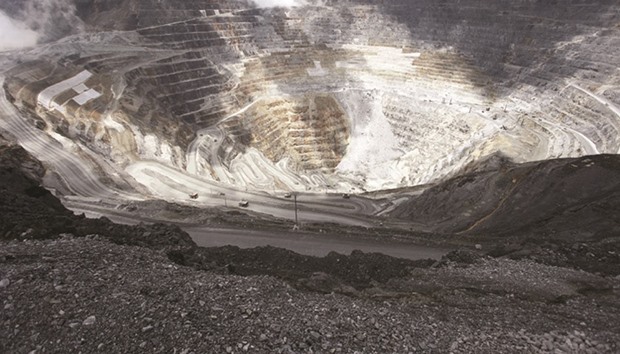 Trucks operate in the open-pit mine of PT Freeportu2019s Grasberg copper and gold mine complex near Timika in Indonesia. A stand-off between Freeport-McMoRan and Indonesia continued on Friday as the government announced it granted the company a new mining licence u2013 and Freeport said it wonu2019t accept it without more certainty.