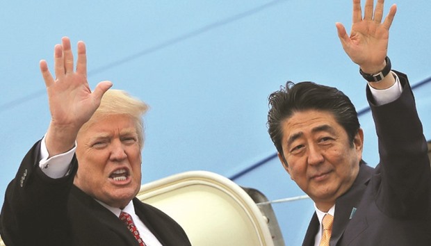 US President Donald Trump and Japanese Prime Minister Shinzo Abe wave as they depart for Palm Beach in Florida. The two leaders emphasised that they remain fully committed to strengthening the economic relationships between the two countries and across the region, based on rules for free and fair trade.