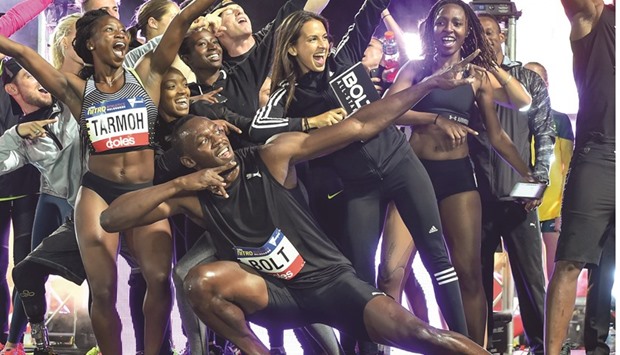 Usain Bolt and his All Stars celebrate after winning the inaugural Nitro Athletics meet in Melbourne yesterday. All Stars pipped hosts Australia in the final standings. (AFP)