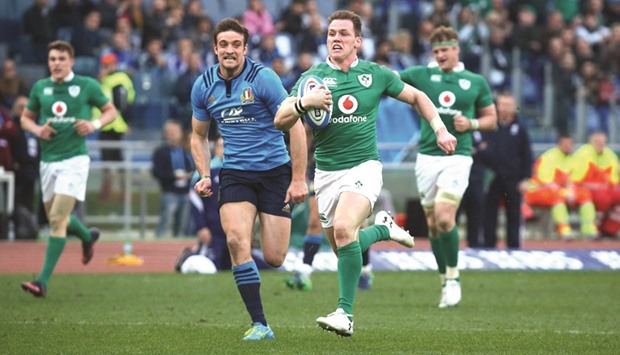 Irelandu2019s Craig Gilroy scores a try during his teamu2019s Six Nations Championship match against Italy at the Stadio Olimpico in Rome.
