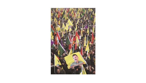 Kurds wave flags and banners during a demonstration in Strasbourg seeking Ocalanu2019s release.