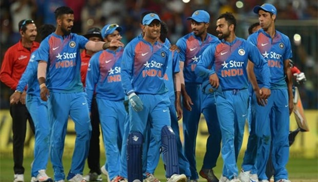 The Indian team celebrates its victory against England at the Chinnaswamy Cricket Stadium in Bengaluru on Wednesday.