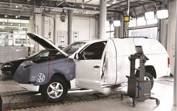 A Volkswagen Amarok car being linked to a computer during a software update at a Service station in Berlin. The German car manufacturer said yesterday it will pay $1.2bn to around 78,000 US buyers of its diesel cars, the last group of customers to be compensated over the u2018dieselgateu2019 scandal.