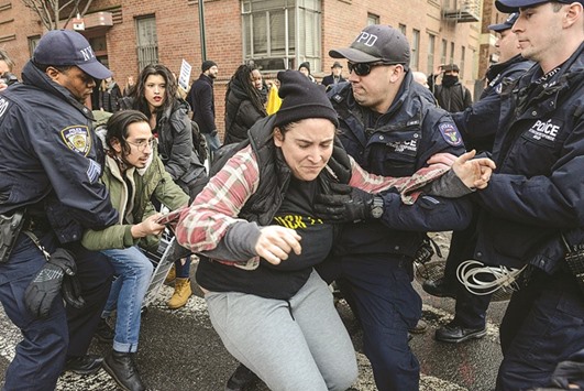 People are arrested during a protest on Saturday against Trumpu2019s immigration policy and the recent ICE raids in New York City.