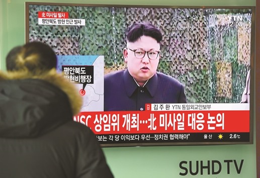 A man watches the news showing footage of North Korean leader Kim Jong-un in Seoul yesterday.