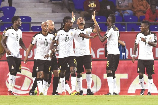 File picture of Ghanau2019s forward Jordan Ayew (C) celebrating with teammates after scoring a goal during the 2017 Africa Cup of Nations quarter-final against Congo.