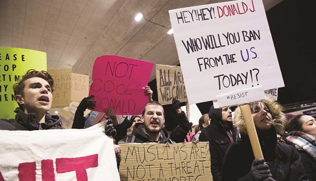 People protest against US President Donald Trumpu2019s executive order banning entry of citizens from seven Muslim-majority countries, at Ou2019Hare International Airport in Chicago.
