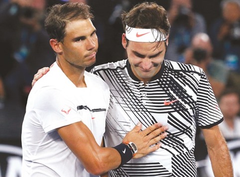 File picture of Switzerlandu2019s Roger Federer consoling Spainu2019s Rafael Nadal after winning the 2017 Australian Open title.