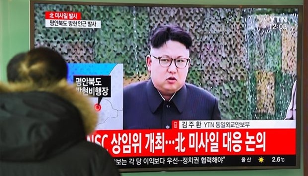A man watches the news showing file footage of North Korean leader Kim Jong-Un at a railway station in Seoul on Sunday. North Korea fired a ballistic missile on Sunday in an apparent provocation to test the response from new US President Donald Trump, the South Korean defence ministry said.