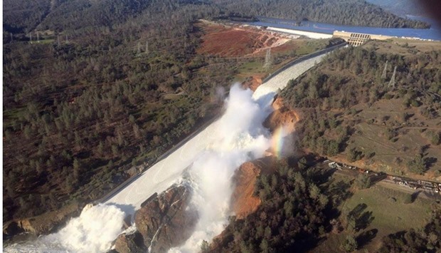 A damaged spillway with eroded hillside is seen in an aerial photo taken over the Oroville Dam in Oroville, California, US February 11, 2017.
