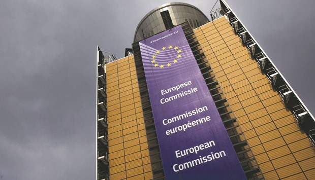 The European Commission headquarters is seen in Brussels. The EU is bracing for troubled times ahead with a new US president that has taken a more protectionist trade stance and with the next two years set to be dominated by negotiations with the UK on its withdrawal from the bloc.