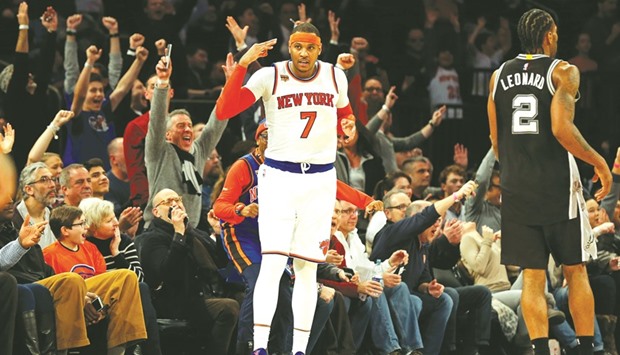 New York Knicks forward Carmelo Anthony reacts after hitting a three-point basket during the second half against the San Antonio Spurs at Madison Square Garden. PICTURE: USA TODAY Sports