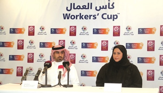 Hassan al-Kuwari (left), executive director, Marketing and Communications at Qatar Stars League, and Fatma al-Nuaimi (right), director, Communications at Supreme Committee for Delivery & Legacy, address a press conference yesterday.